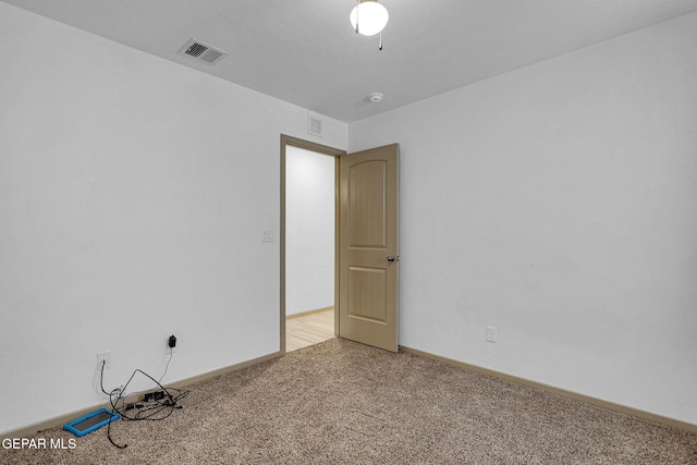 view of carpeted spare room