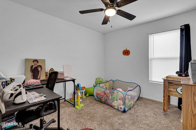 carpeted bedroom with ceiling fan