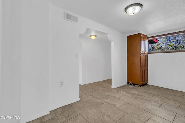 view of tiled empty room