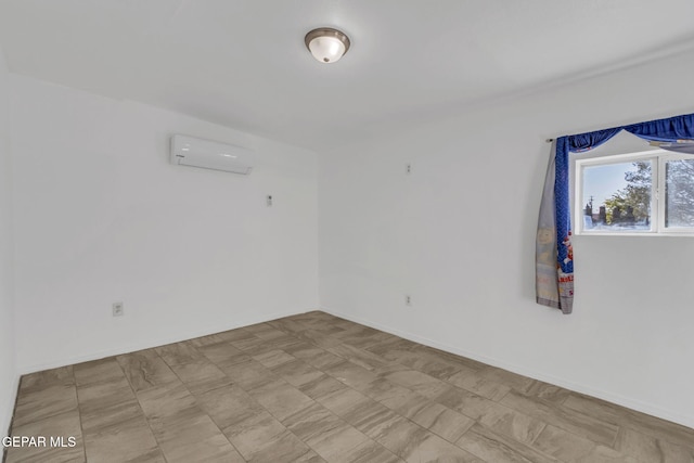 empty room featuring a wall mounted AC