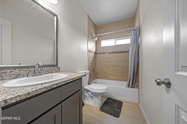 full bathroom featuring shower / bath combination with curtain, vanity, and toilet