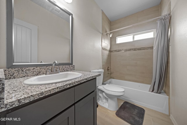 full bathroom featuring vanity, shower / tub combo, and toilet