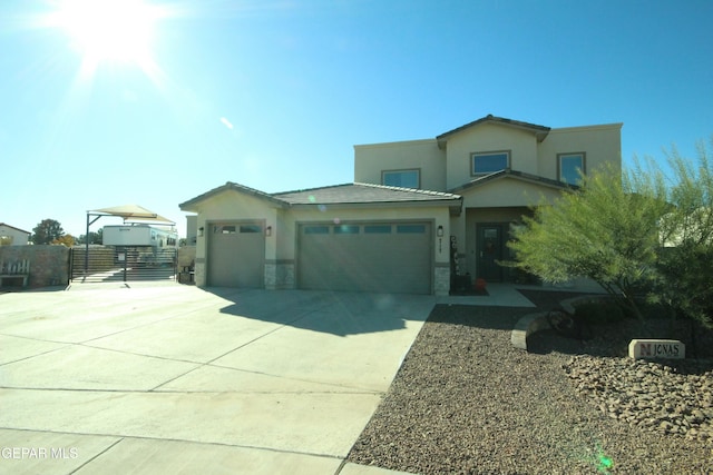 view of front of property with a garage