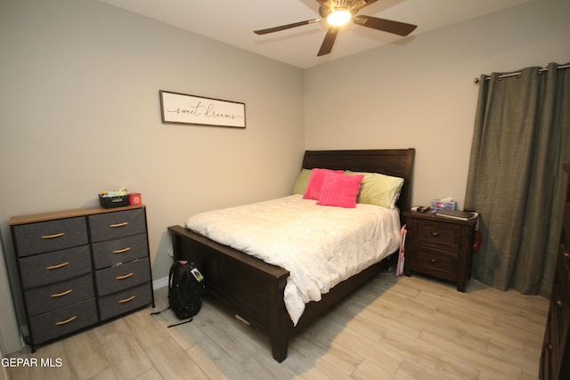 bedroom featuring ceiling fan and light hardwood / wood-style flooring