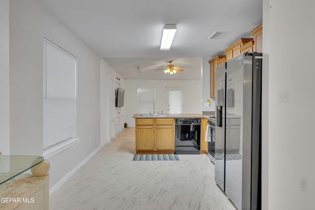 kitchen featuring kitchen peninsula, appliances with stainless steel finishes, light brown cabinetry, ceiling fan, and sink