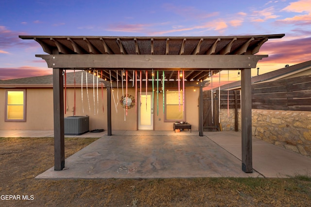 patio terrace at dusk with cooling unit