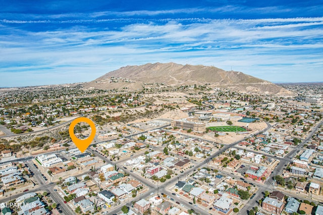 drone / aerial view featuring a mountain view