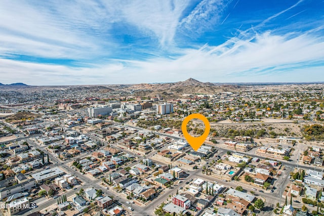 drone / aerial view featuring a mountain view