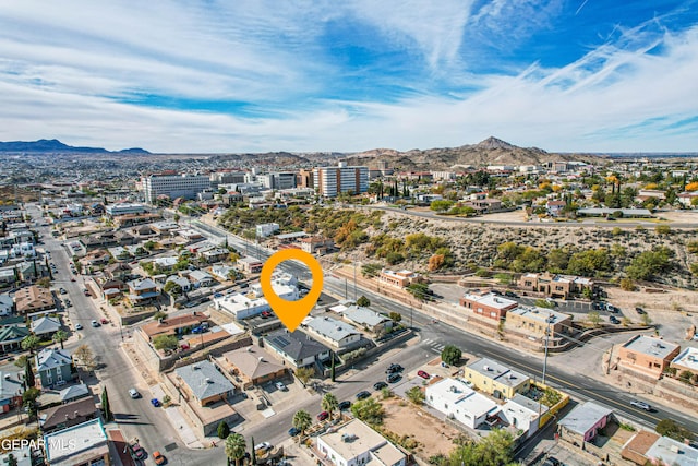 drone / aerial view featuring a mountain view