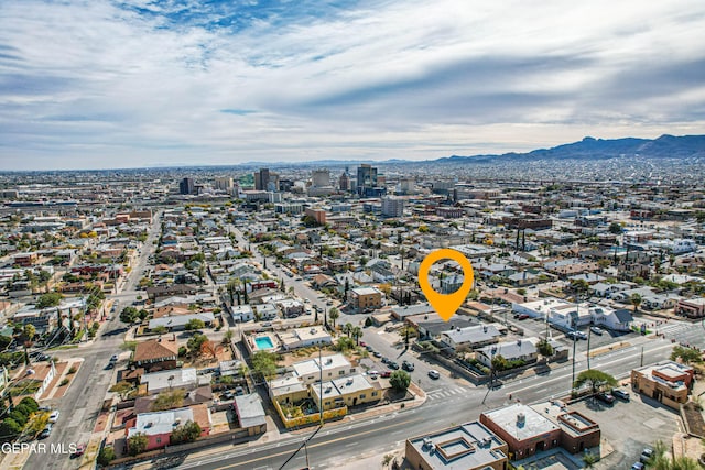 birds eye view of property featuring a mountain view