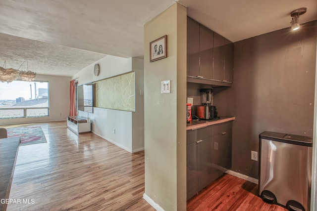 kitchen with hardwood / wood-style floors