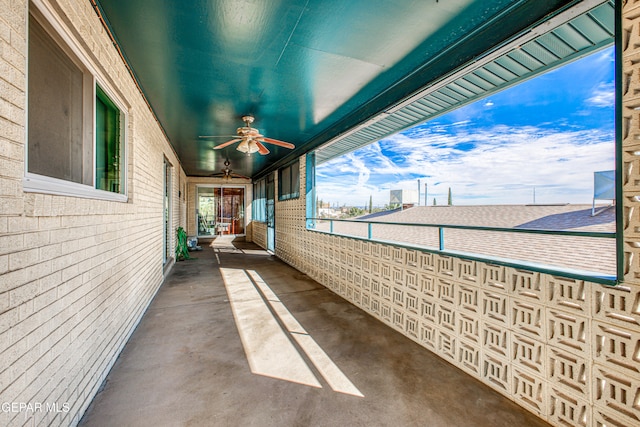 view of patio / terrace featuring ceiling fan