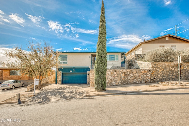 view of front of home featuring a garage