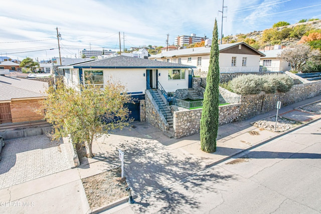 view of front of property featuring a garage