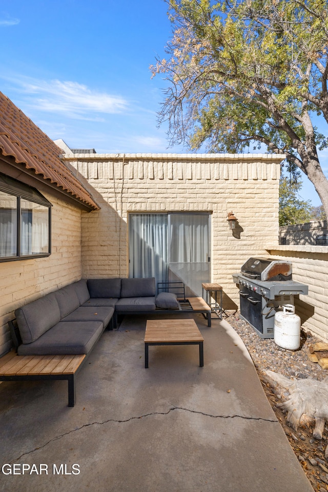 view of patio featuring an outdoor hangout area and grilling area