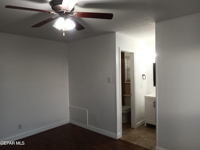 interior space with hardwood / wood-style floors and ceiling fan