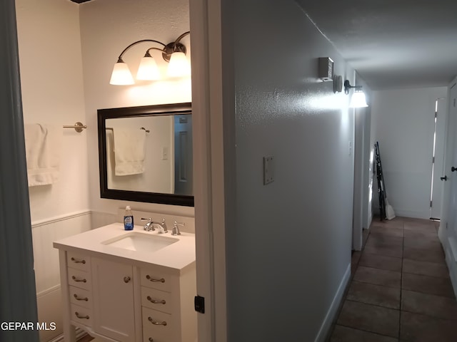 bathroom featuring tile patterned floors and vanity