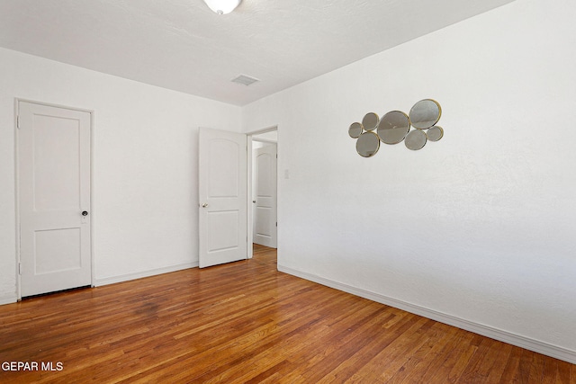 interior space with hardwood / wood-style flooring