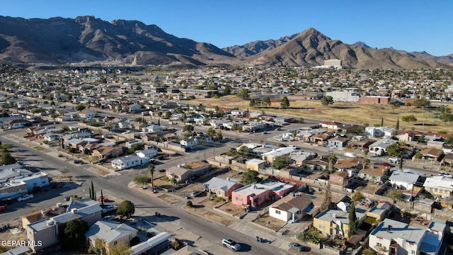 birds eye view of property featuring a mountain view