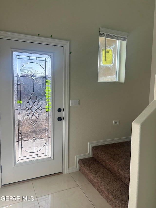 view of tiled entrance foyer