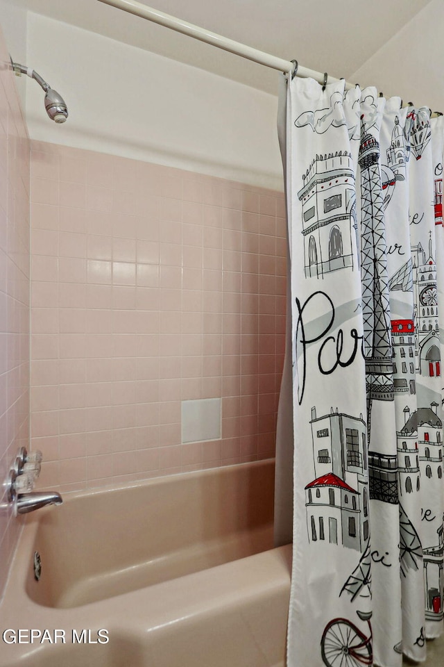 bathroom with shower / bath combo