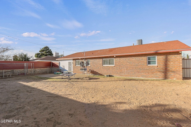 rear view of property with a patio