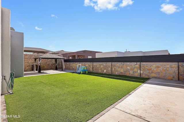 view of yard with a gazebo and a patio area