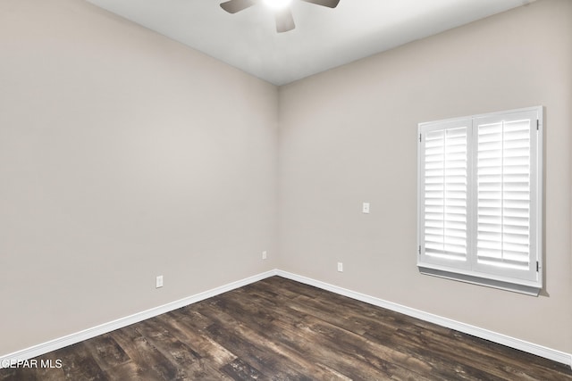 unfurnished room featuring ceiling fan and dark hardwood / wood-style floors