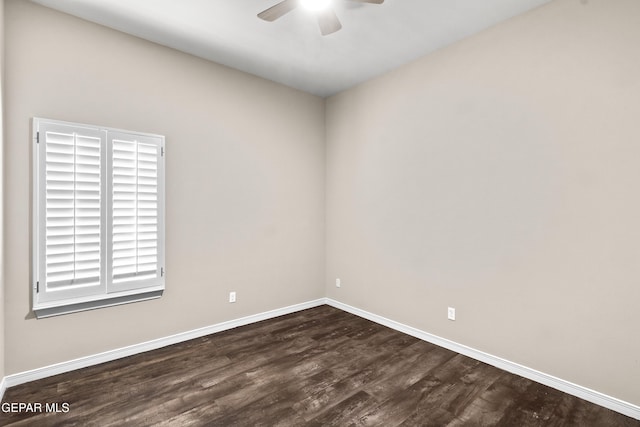 spare room with hardwood / wood-style floors and ceiling fan