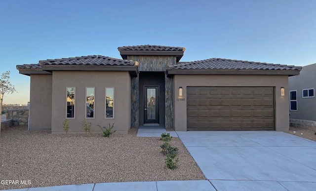 view of front of property featuring a garage