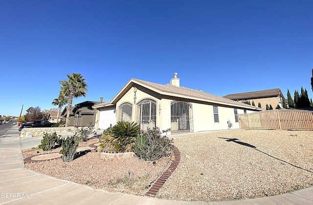 ranch-style home with a garage