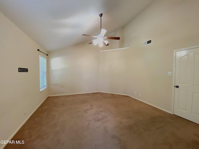 spare room featuring carpet flooring, ceiling fan, and high vaulted ceiling