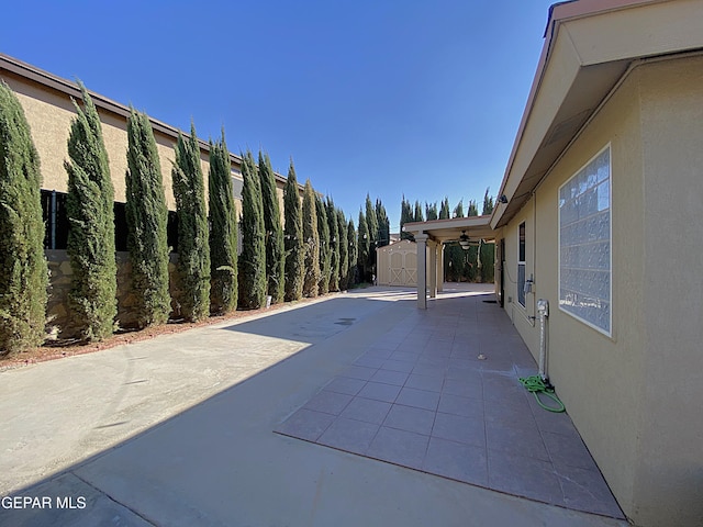 view of patio / terrace with a storage shed