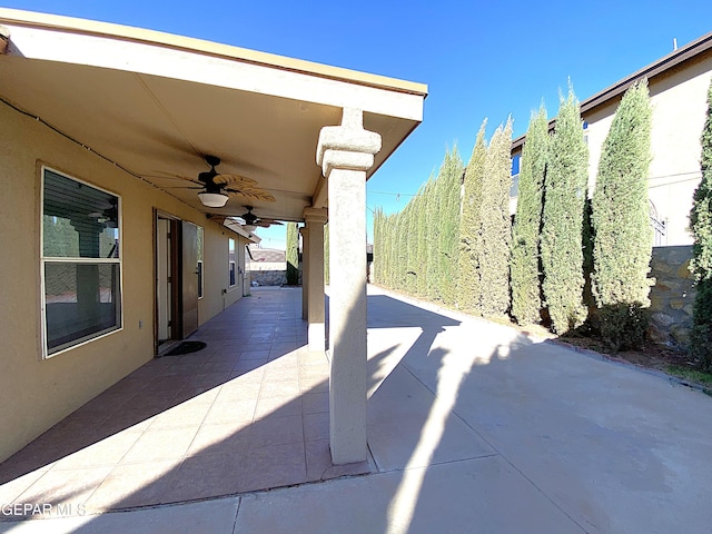 view of patio featuring ceiling fan