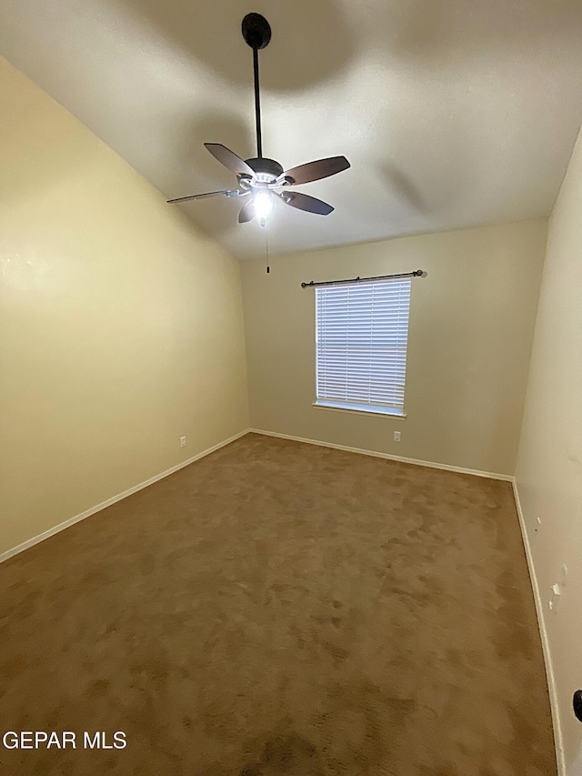 unfurnished room with carpet and ceiling fan