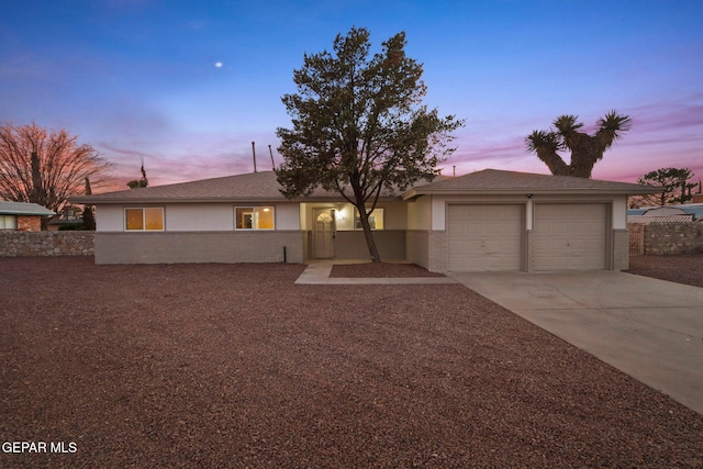 ranch-style home with a garage