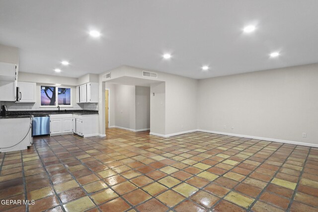 kitchen with white cabinets and dishwasher