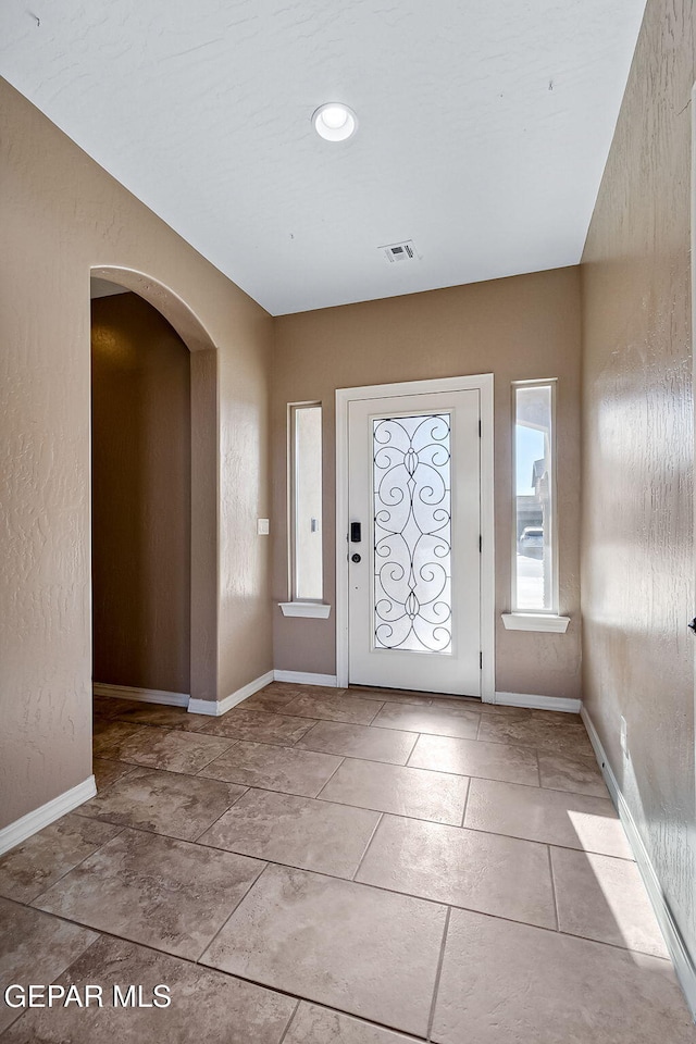 view of tiled entrance foyer