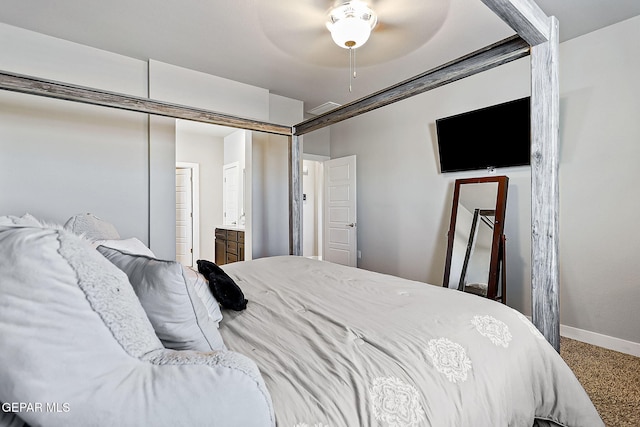 carpeted bedroom featuring ceiling fan and connected bathroom