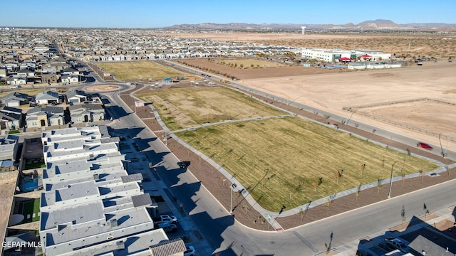 drone / aerial view featuring a mountain view