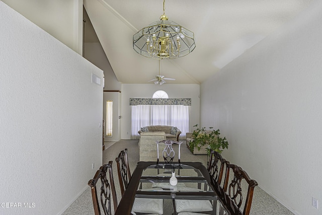 4228 Marcus Uribe Dr, El Paso, TX 79934 - carpeted dining area featuring a chandelier, lofted ceiling, a ceiling fan, and baseboards