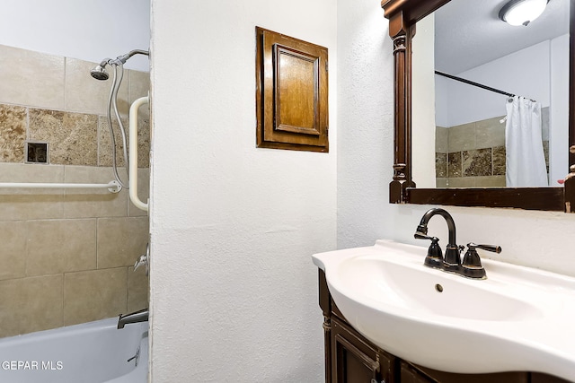 bathroom with vanity and shower / bathtub combination with curtain