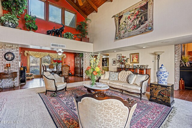 living room with beamed ceiling, wooden ceiling, and high vaulted ceiling