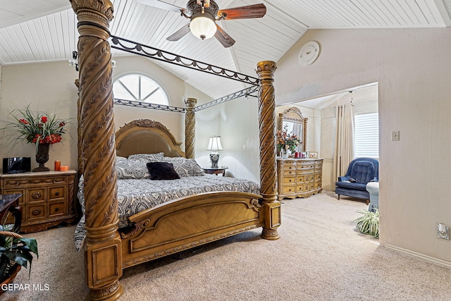 carpeted bedroom with ceiling fan, wooden ceiling, and vaulted ceiling