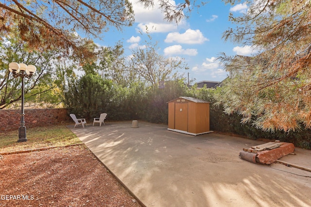 view of patio / terrace featuring a shed