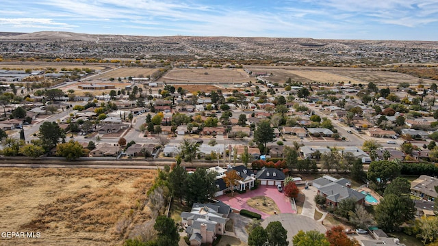 drone / aerial view featuring a mountain view