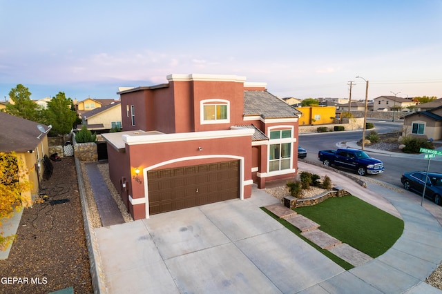 view of front of property featuring a garage