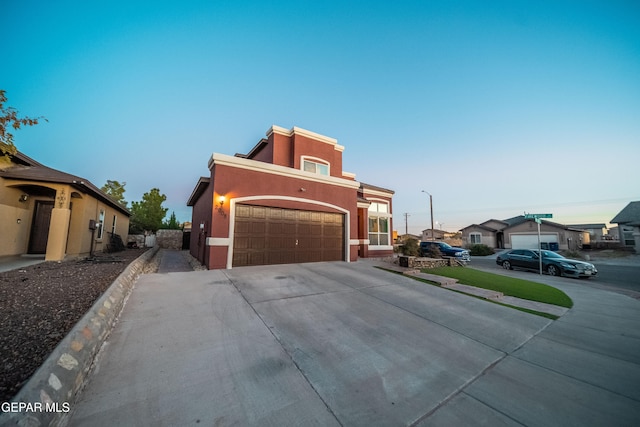 view of front of property featuring a garage