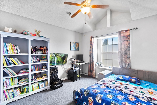 bedroom with carpet, a textured ceiling, vaulted ceiling, and ceiling fan