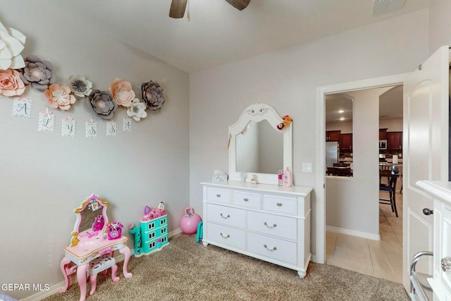 playroom featuring ceiling fan and light colored carpet